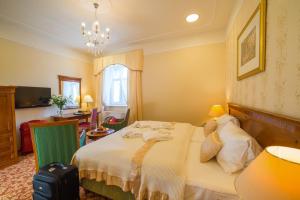 Łóżko lub łóżka w pokoju w obiekcie Spa Resort PAWLIK-AQUAFORUM