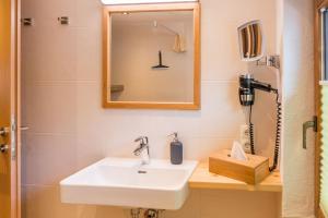 Koupelna v ubytování Das kleine Bio Hotel Tiefenbach