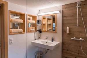 Koupelna v ubytování Das kleine Bio Hotel Tiefenbach