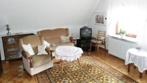 TV a/nebo společenská místnost v ubytování Haus Müller + 4 fotografie