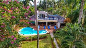 an aerial view of a house with a swimming pool at Casa Inca in Las Terrenas