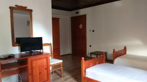 Cama o camas de una habitación en Shtastlivcite Family Hotel