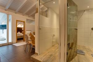 Kúpeľňa v ubytovaní Am Dorfplatz Suites - Adults only + 37 fotografií