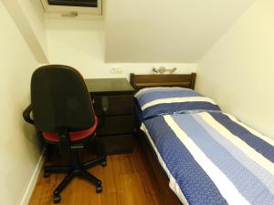 Postel nebo postele na pokoji v ubytování Apartmánový Penzión Bojnice