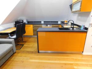 Kuchyň nebo kuchyňský kout v ubytování Apartmánový Penzión Bojnice + 37 fotografií