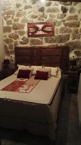 Posteľ alebo postele v izbe v ubytovaní casa rural La Fragua