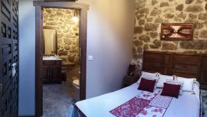 Posteľ alebo postele v izbe v ubytovaní casa rural La Fragua