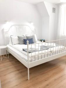 מיטה או מיטות בחדר ב-Wildwood Villa
