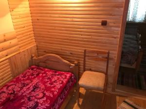 Postel nebo postele na pokoji v ubytování Shelest Vody