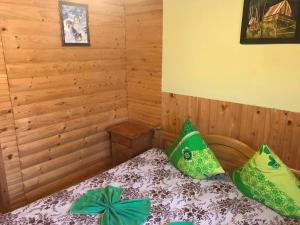 Postel nebo postele na pokoji v ubytování Shelest Vody