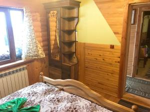 Postel nebo postele na pokoji v ubytování Shelest Vody