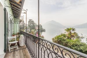 a balcony with a view of a body of water at Casa Paola in Perledo