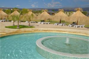 Πισίνα στο ή κοντά στο Arenas Blancas Cabañas & Suites
