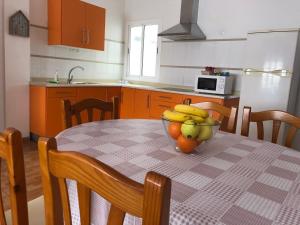 Kuchyň nebo kuchyňský kout v ubytování Apartamentosánchez