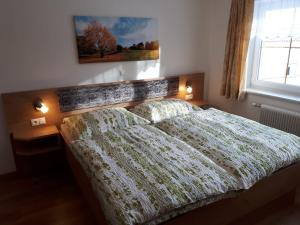Katil atau katil-katil dalam bilik di Ferienhaus Reinfrank