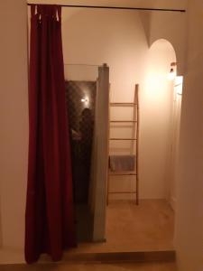 Palanda nebo palandy na pokoji v ubytování B&b Il Cortile
