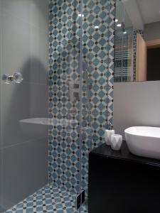 Koupelna v ubytování Comely luxury Apt Must