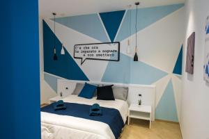 Postel nebo postele na pokoji v ubytování B&B Luna per te