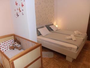 Postel nebo postele na pokoji v ubytování Apartment Steblaj