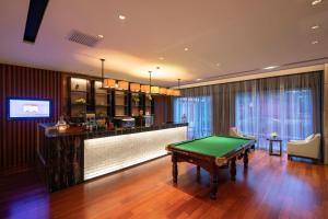 Sjónvarps- og/eða afþreyingartæki á Crystal Orange Hotel Shanghai Kangqiao Branch