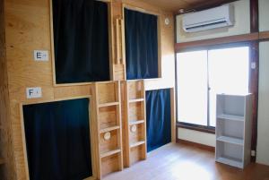 Ένα ή περισσότερα κρεβάτια σε δωμάτιο στο Nomad Hostel Classic