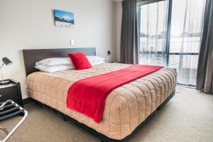 Postel nebo postele na pokoji v ubytování Bay Palm Motel
