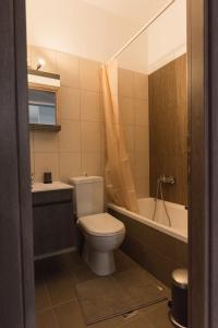 Koupelna v ubytování Centrally Located Apartment + 6 fotografií