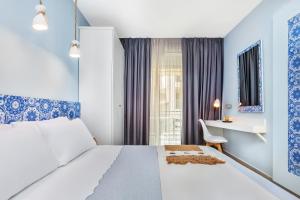 Postelja oz. postelje v sobi nastanitve Core Hotel