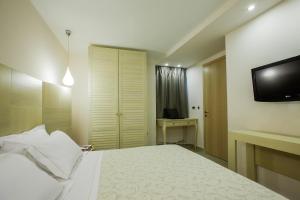 Postelja oz. postelje v sobi nastanitve Core Hotel