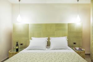 Postelja oz. postelje v sobi nastanitve Core Hotel