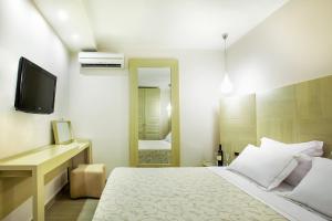 Postelja oz. postelje v sobi nastanitve Core Hotel