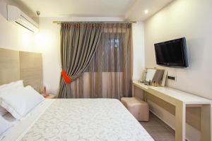 Postelja oz. postelje v sobi nastanitve Core Hotel