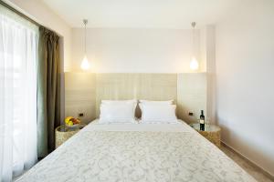 Postelja oz. postelje v sobi nastanitve Core Hotel