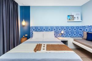 Postelja oz. postelje v sobi nastanitve Core Hotel