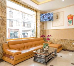 TV a/nebo společenská místnost v ubytování Roy Dala Hotel
