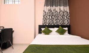 Voodi või voodid majutusasutuse Itsy Hotels Shivaas Kuteera, 450m from Narayana Multi Speciality Hospital toas