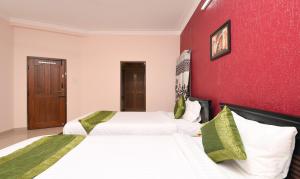 Voodi või voodid majutusasutuse Itsy Hotels Shivaas Kuteera, 450m from Narayana Multi Speciality Hospital toas