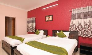 Voodi või voodid majutusasutuse Itsy Hotels Shivaas Kuteera, 450m from Narayana Multi Speciality Hospital toas
