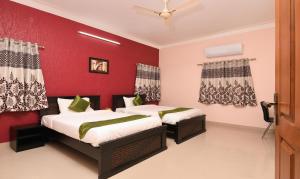 Voodi või voodid majutusasutuse Itsy Hotels Shivaas Kuteera, 450m from Narayana Multi Speciality Hospital toas