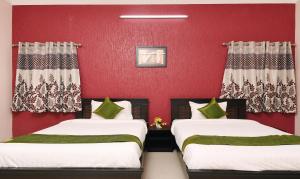 Voodi või voodid majutusasutuse Itsy Hotels Shivaas Kuteera, 450m from Narayana Multi Speciality Hospital toas