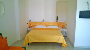 Postel nebo postele na pokoji v ubytování Residence Nido Verde