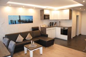 Dapur atau dapur kecil di Terrassenhaus Penthouse-Wohnung 93