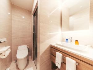 Ванная комната в Royal View Hotel Churaumi