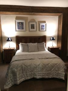 Postel nebo postele na pokoji v ubytování Hostal Avalon