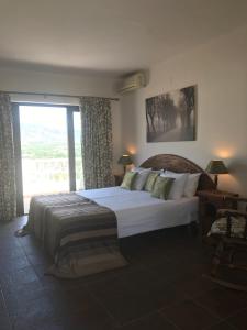 Postel nebo postele na pokoji v ubytování Hostal Avalon