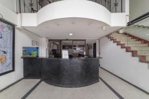 a stairway with a black counter in a building at Ayenda 1030 Elegant Suite in Bogotá