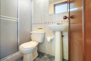 Un baño de Hotel Elegant Suite