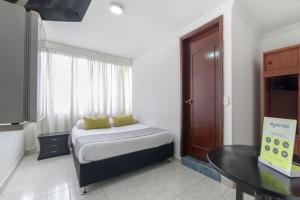 Cama o camas de una habitación en Hotel Elegant Suite