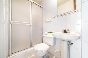 Un baño de Hotel Elegant Suite