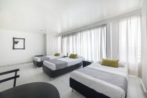 Cama o camas de una habitación en Hotel Elegant Suite